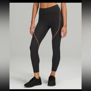 NWT lululemon power thru high rise leggings 25” size 4 in black and orange seams